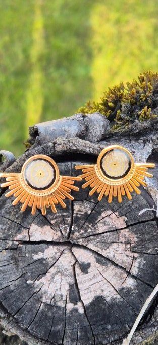 Clous d'oreilles soleil 