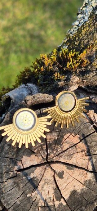 Clous d'oreilles soleil 