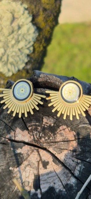 Clous d'oreilles soleil 