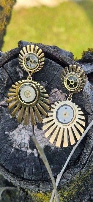 Clous d'oreilles soleils