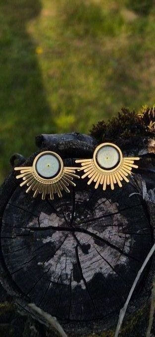 Clous d'oreilles soleil 